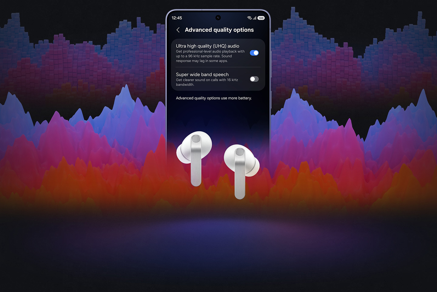 Galaxy smartphone with the 'Advanced quality options' screen open. On the screen, 'Ultra high quality (UHQ) audio' is turned on and the 'Super wide band speech' is turned off. In front of the screen is a pair of white, Galaxy Buds4 Pro.